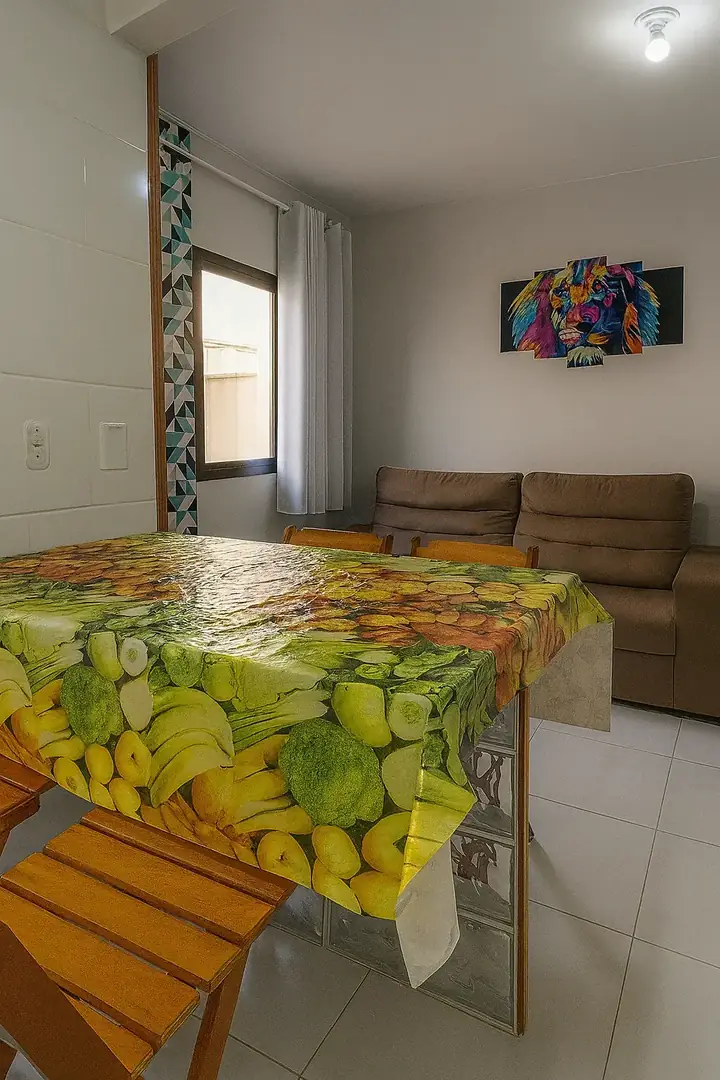 Ambiente do apartamento JM 303 com mesa posta